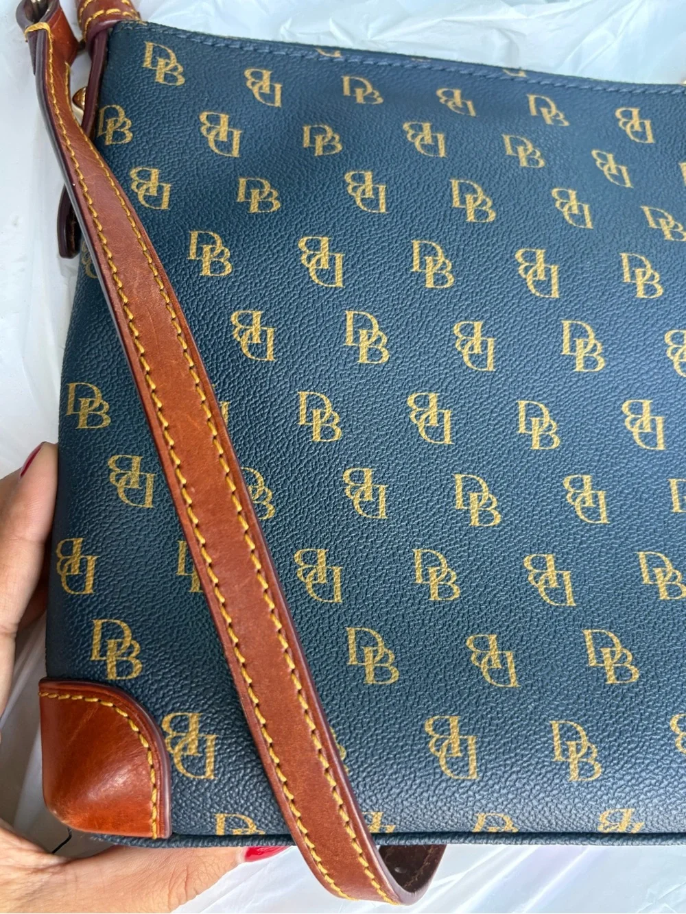 Dooney & Bourke navy with Brown Trim Monogram Crossbody